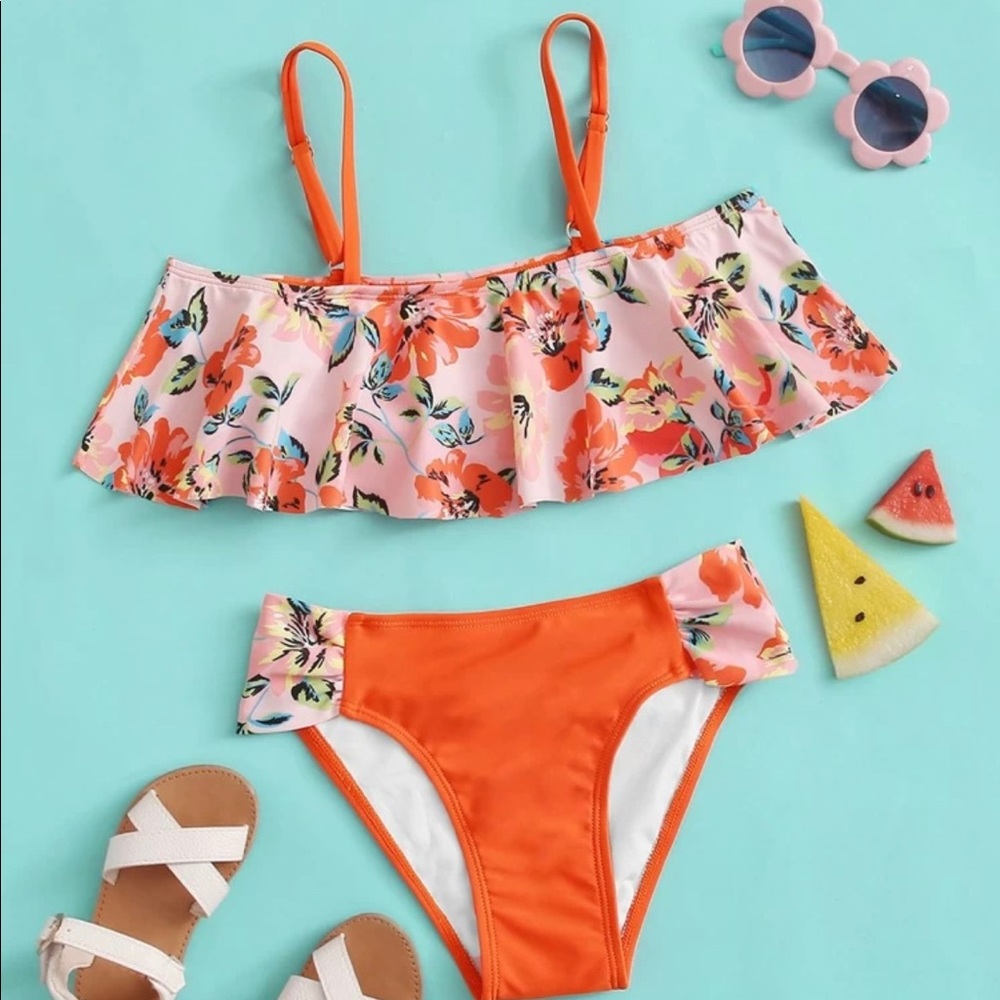 Girls Floral print swimsuit. Size 9-11yrs